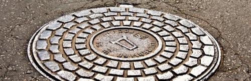 enseig-chute-plaque-egout.jpg